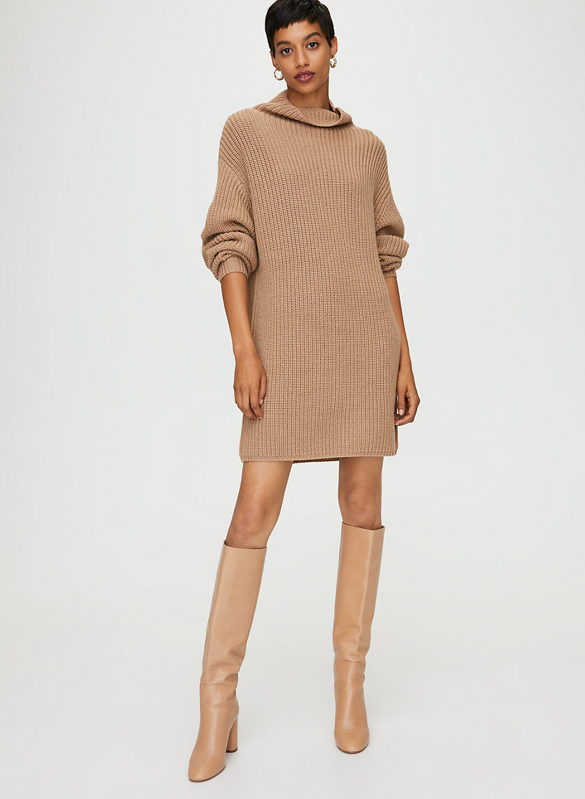 Sweater dress with knee-high boots